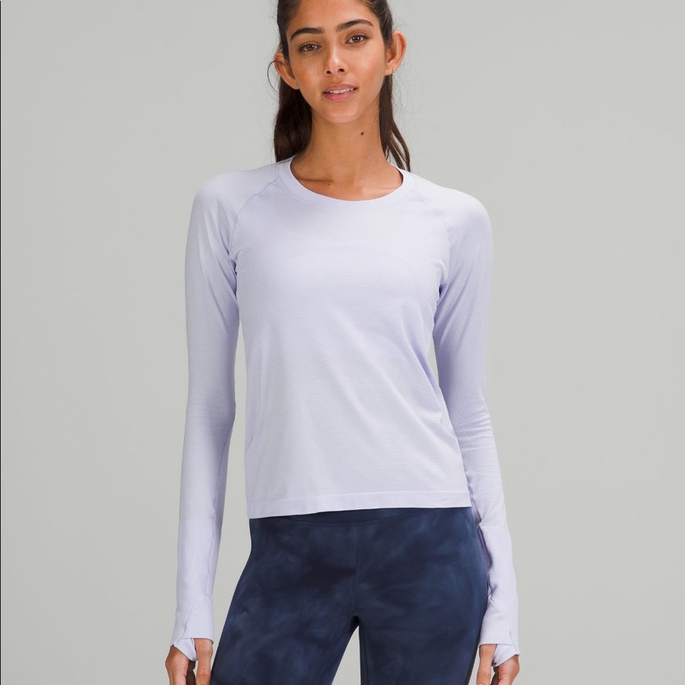 Lavender ‘Run Swiftly 2.0’ top from Lululemon in size 4.